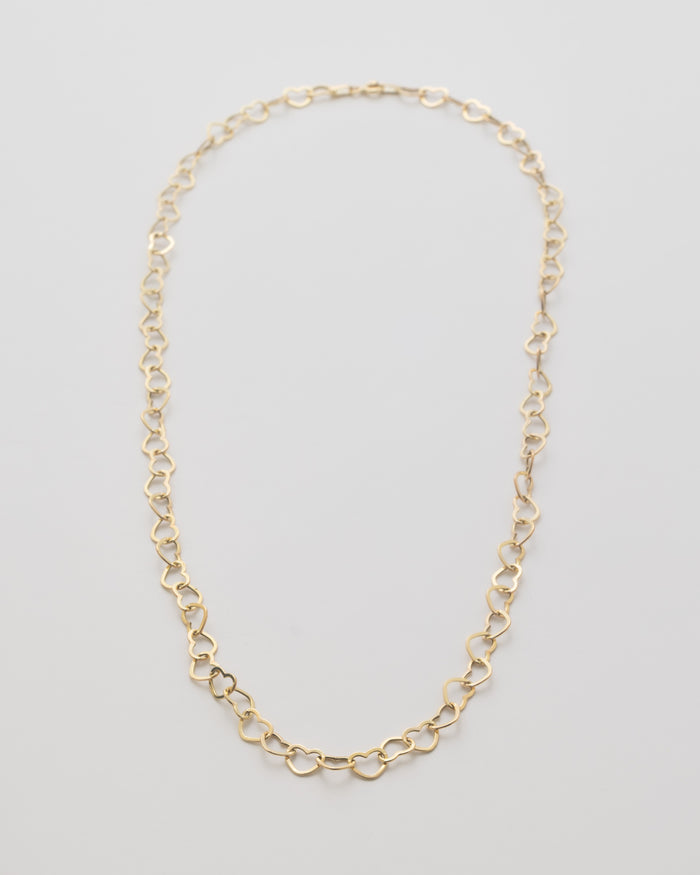 Cœur Chaîne heart link necklace — 18K yellow gold — lifestyle photo — Safy Collective