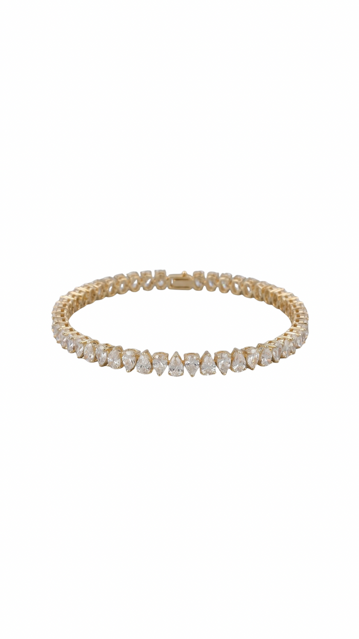 Pear shape tennis bracelet 18K yellow gold — on wrist — Safy Collective