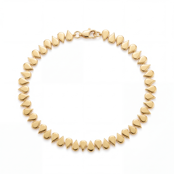 Upside-Down Pear Shape Bracelet in solid 18k yellow gold: pear plates alternating up and down, true scale